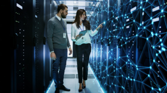 Female,And,Male,It,Engineers,Discussing,Technical,Details,In,A